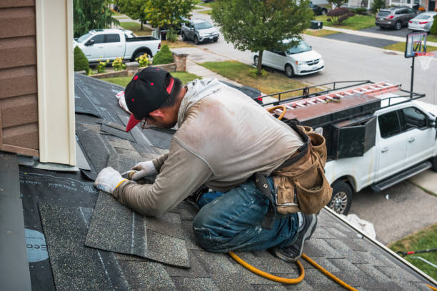 Professional Roofing technician working in Congerville, IL